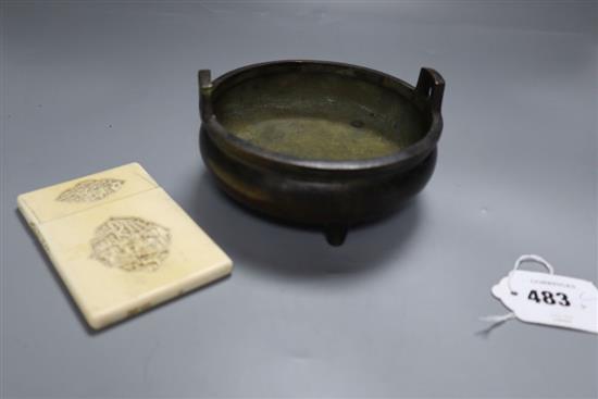 A Chinese bronze shallow tripod censer, Qianlong mark, late Qing, diameter 15cm, together with a Canton ivory card case